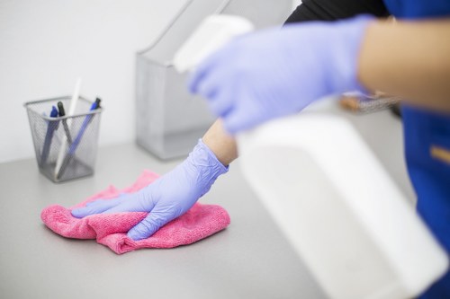 Carpet cleaning operative reviewing safe chemical use