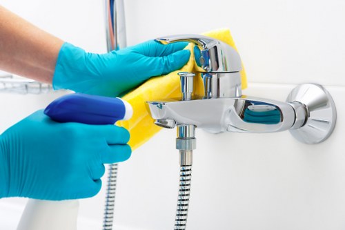 Technician wearing PPE while carrying out professional carpet cleaning