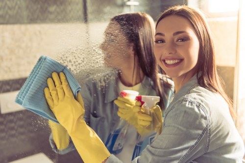 Professional carpet cleaner treating a stained carpet